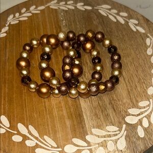 White House black market trio 3 Gold and Brown Beaded stretchy Bracelet Set